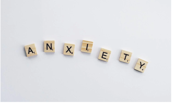 Scrabble pieces spelling Anxiety as title of post on Anxiety counselling in Farnham Surrey